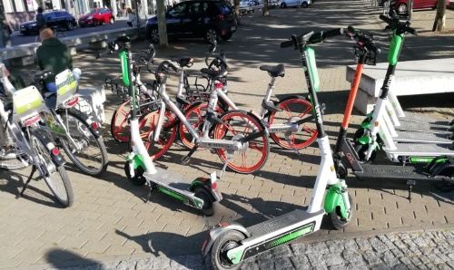 Green scooters on the streets of Berlin