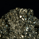 Close up of a gold mineral.